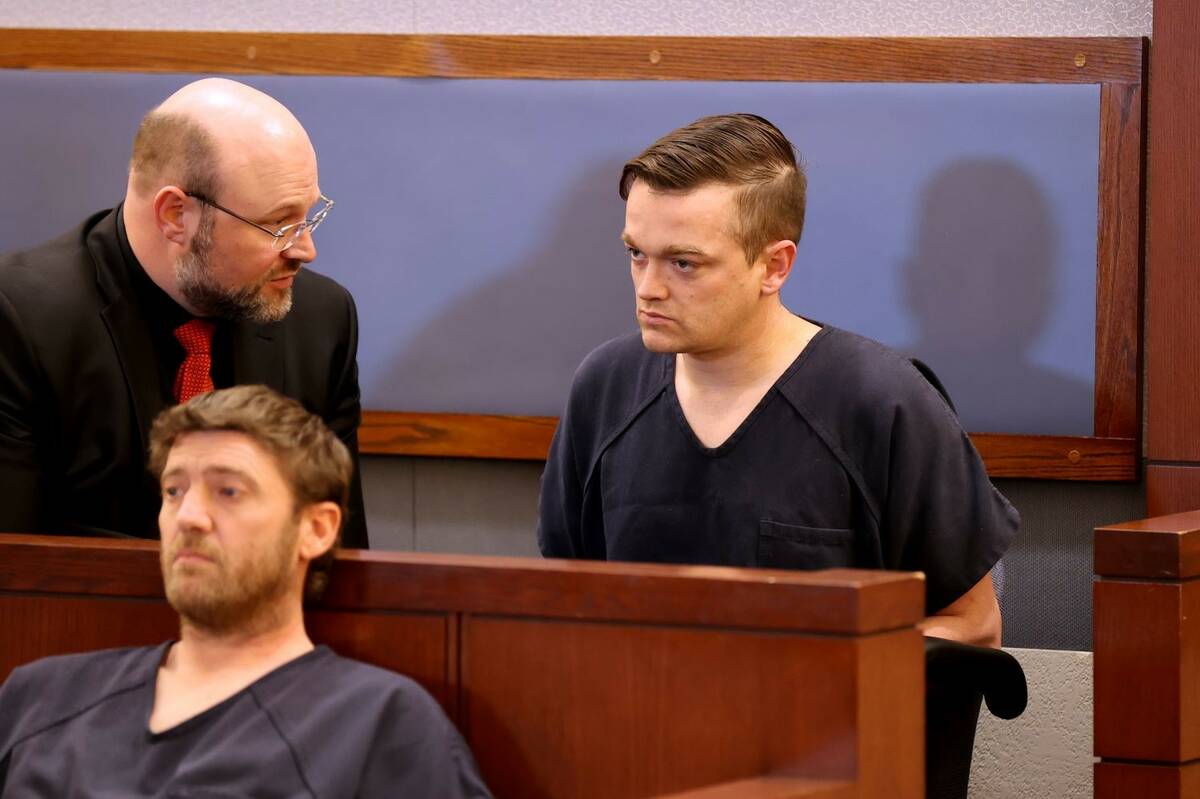 Brandon Toseland, right, confers with his attorney, Augustus Claus, in court at the Regional Ju ...