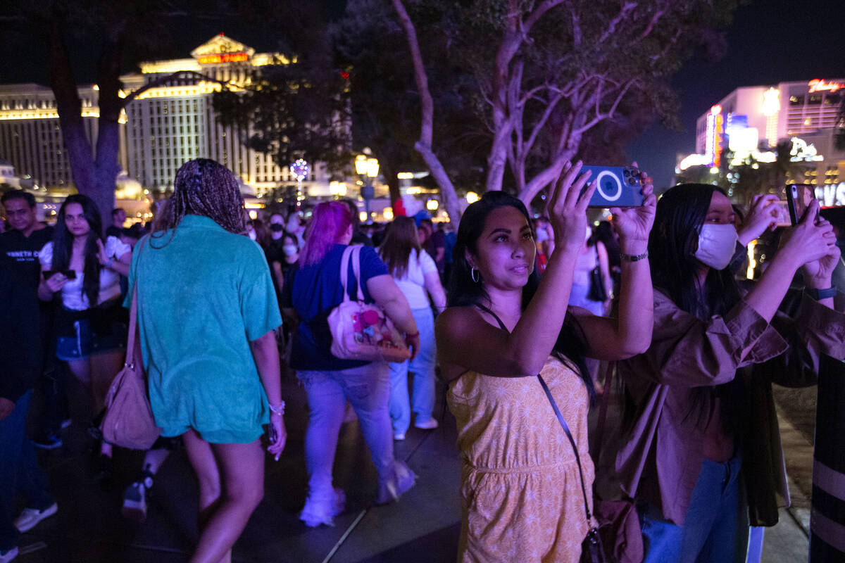 Rhea Carpenter, second from right, and her daughter Alanah Camacho, right, photograph Las Vegas ...