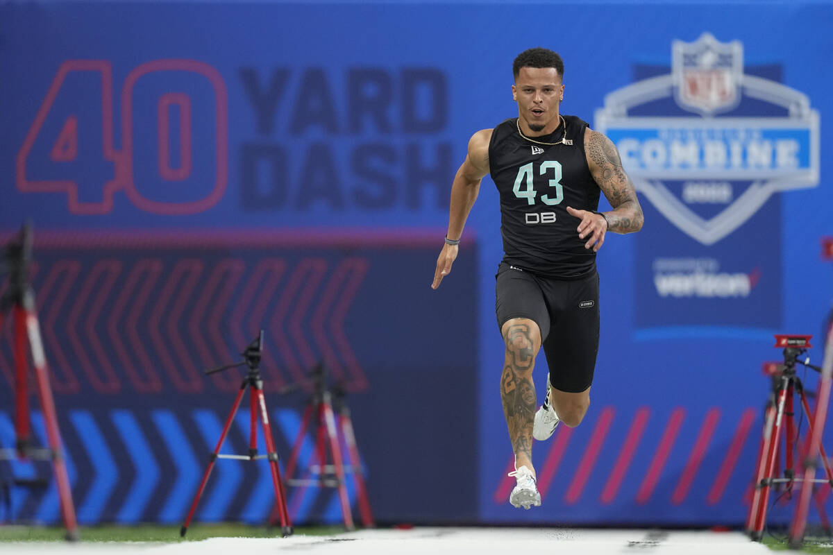Miami defensive back Bubba Bolden runs the 40-yard dash at the NFL football scouting combine, S ...