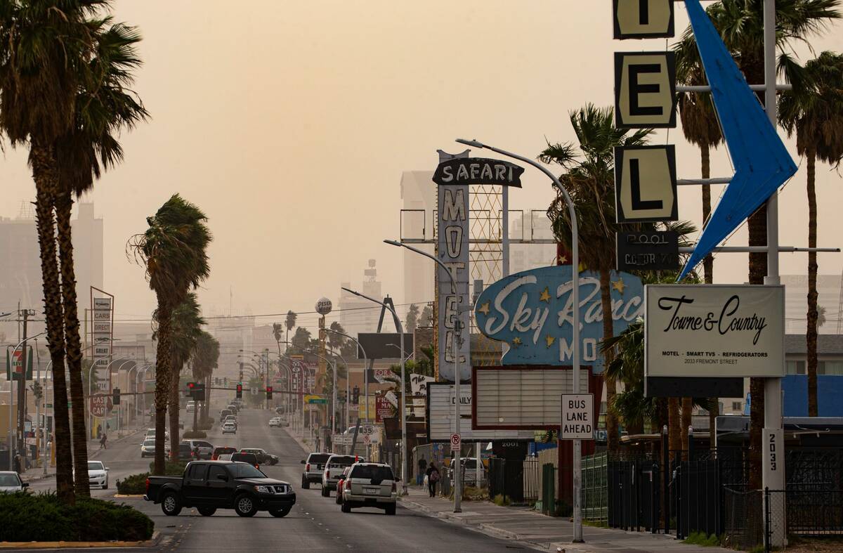 A view down east Fremont Street as winds bring in a dust storm on Monday, April 11, 2022, over ...