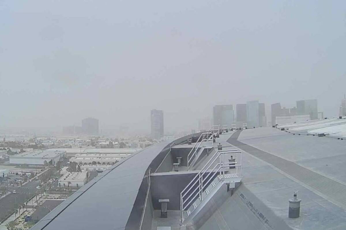 A dust storm takes over the Strip, as seen from the roof of Allegiant Stadium, on Monday, April ...