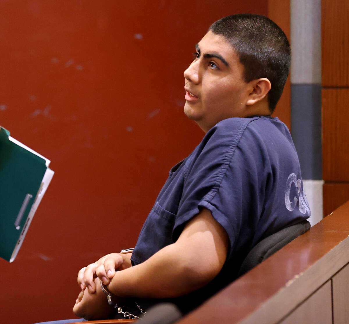 Jonathan Eluterio Martinez Garcia waits in court for a status check at the Regional Justice Cen ...