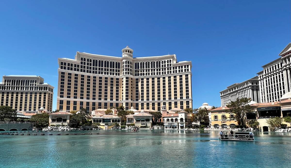 Work begins on the NFL Draft stage at the Fountain of Bellagio on Wednesday, April 13, 2022, in ...
