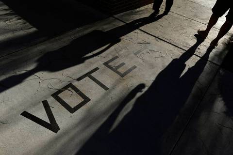 Voters head to the polls at the Enterprise Library in Las Vegas in November 2018. (AP Photo/Jo ...