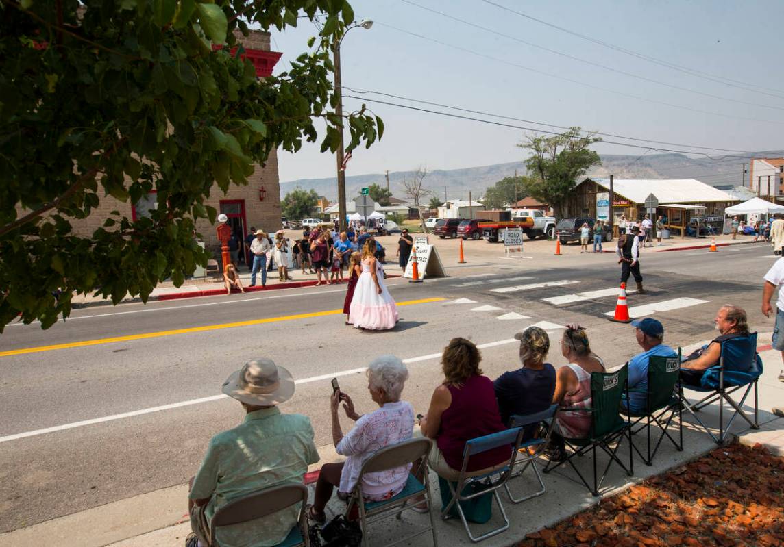 Attendees watch the parade during the Goldfield Days celebration in Goldfield on Saturday, Aug. ...