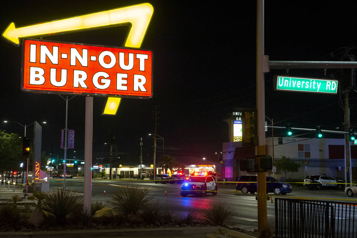 Metropolitan police investigate a homicide at 4680 South Maryland Parkway, across from the UNLV ...