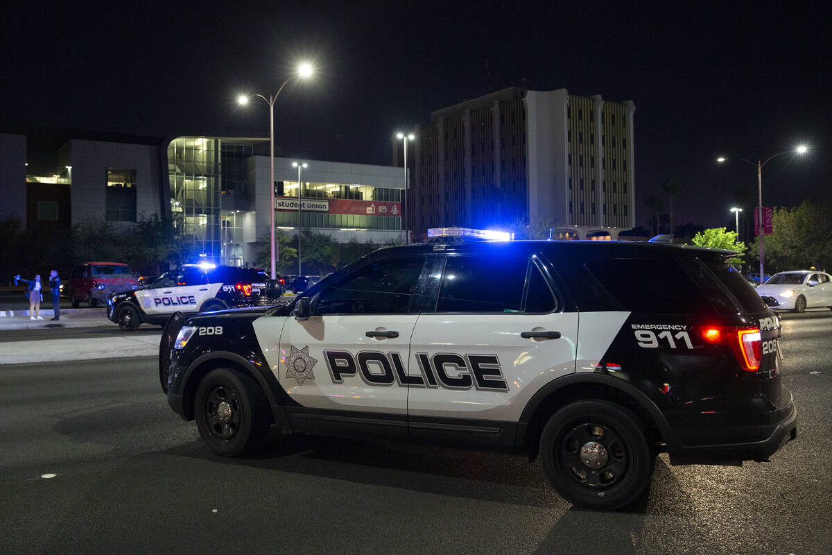 Metropolitan police investigate a homicide at 4680 South Maryland Parkway, across from the UNLV ...