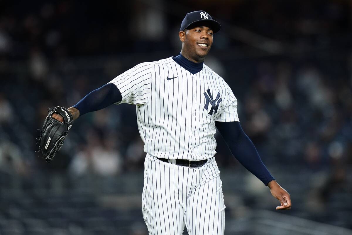 New York Yankees relief pitcher Aroldis Chapman reacts during the ninth inning of a baseball ga ...