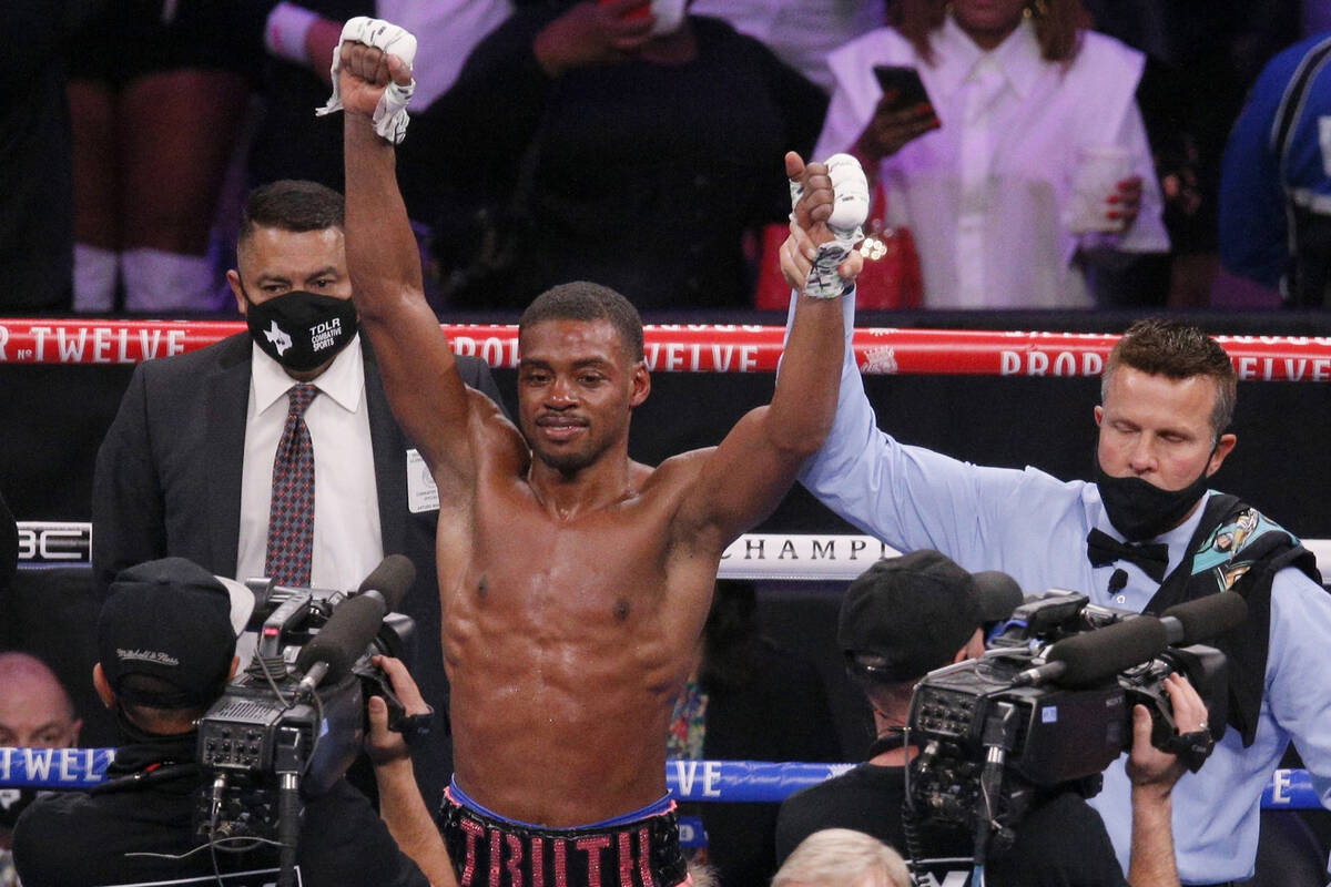 Errol Spence Jr. celebrates after defeating Danny Garcia by unanimous decision in a welterweigh ...