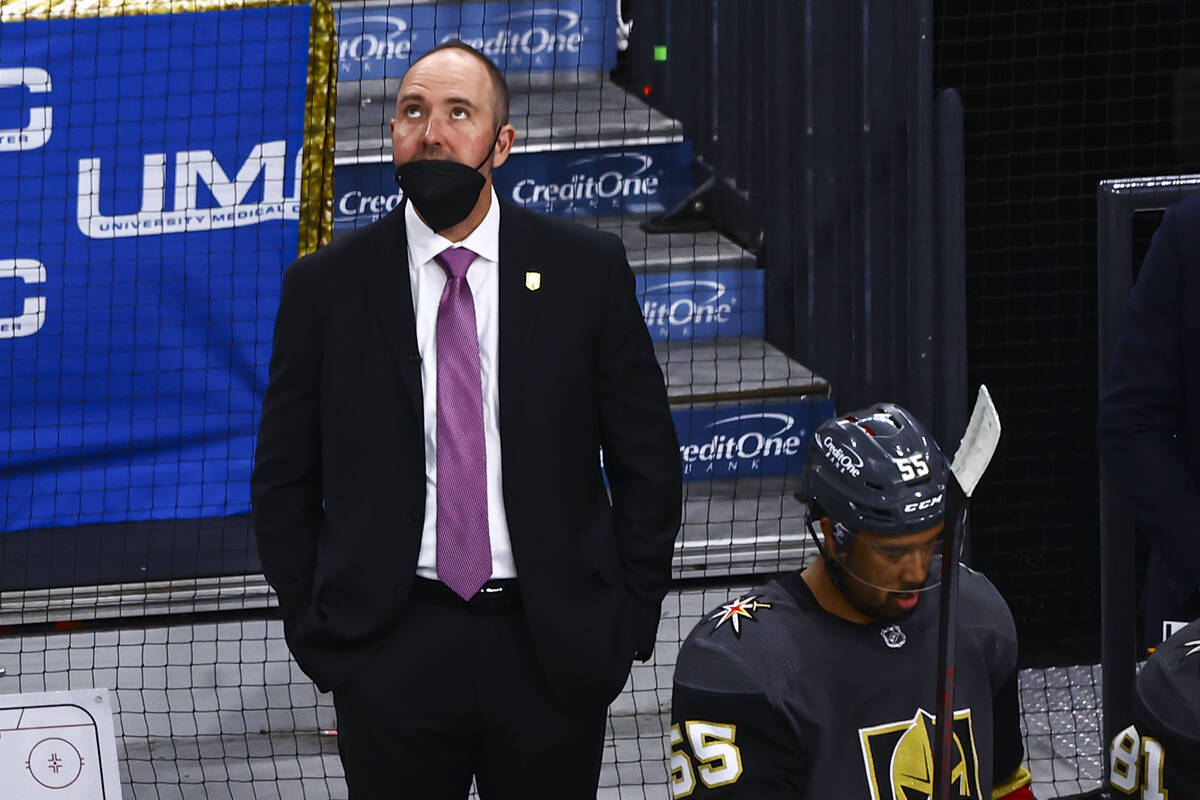 Golden Knights head coach Pete DeBoer looks on during the first period of Game 2 in an NHL hock ...