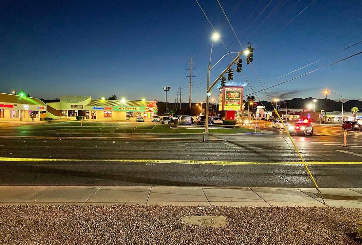 Police tape surrounds a parking lot near West Flamingo Road and South Jones Boulevard after a f ...