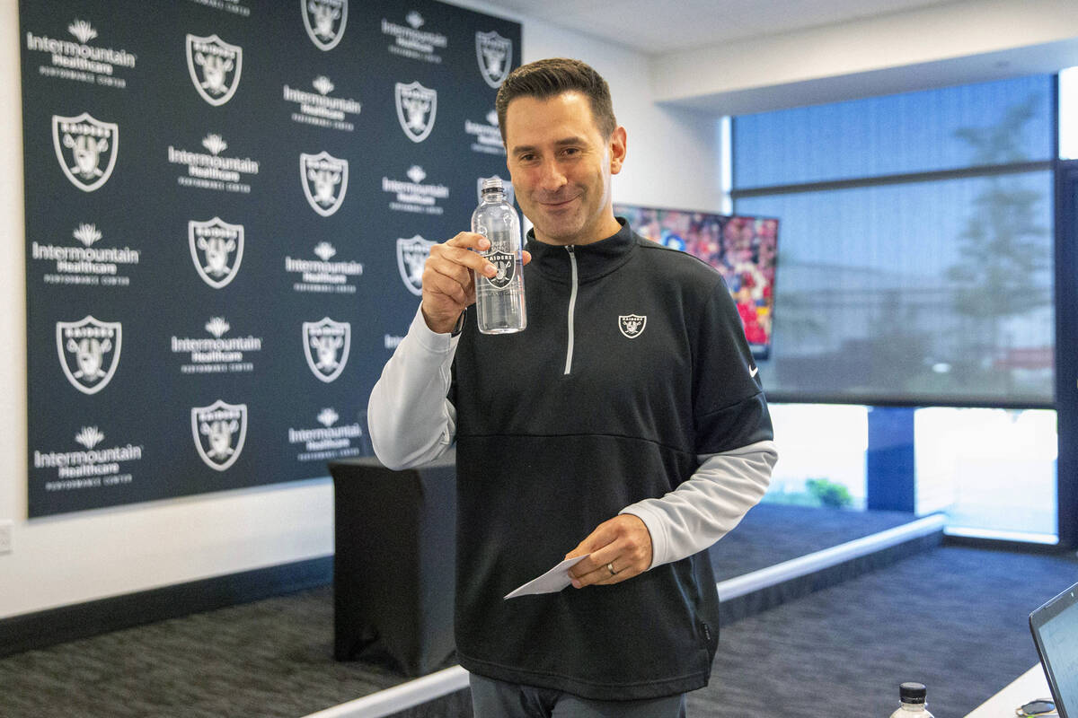 Raiders general manager Dave Ziegler poses as he leaves a news conference on Wednesday, April 2 ...