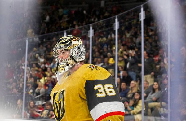 Golden Knights goaltender Logan Thompson (36) circles the ice in overtime during an NHL hockey ...
