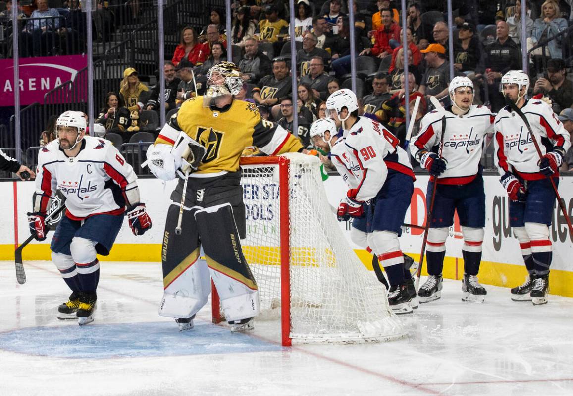 Washington Capitals left wing Alex Ovechkin (8) scores against Golden Knights goaltender Logan ...