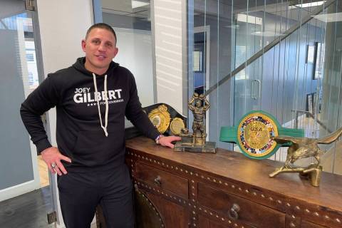 Joey Gilbert, Reno attorney and Republican candidate for governor, stands next to his boxing tr ...