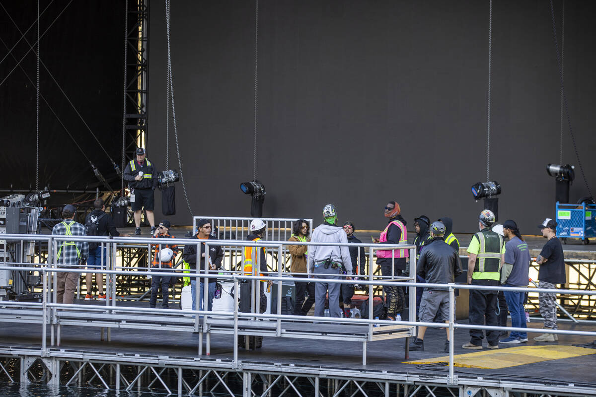 Crews continue with preparations for the NFL Draft 2022 stage at the Bellagio Fountains on Satu ...