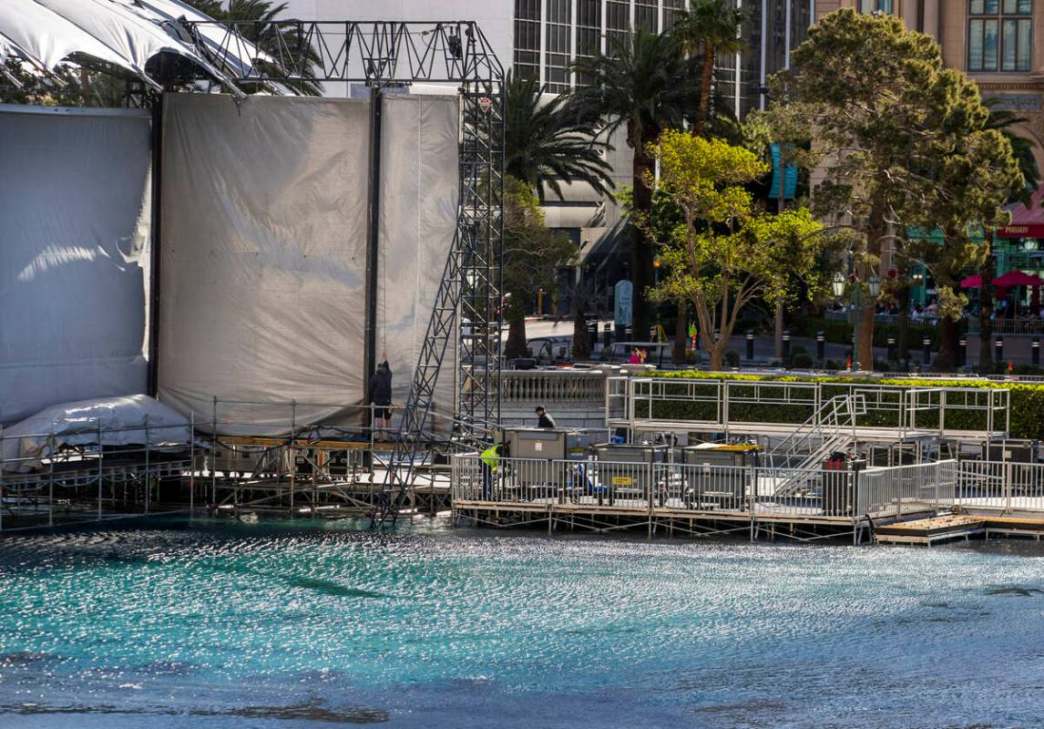 Crews continue with preparations for the NFL Draft 2022 stage at the Bellagio Fountains on Satu ...