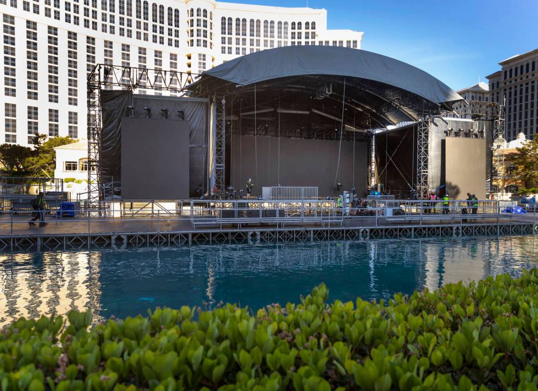 Crews continue with preparations for the NFL Draft 2022 stage at the Bellagio Fountains on Satu ...