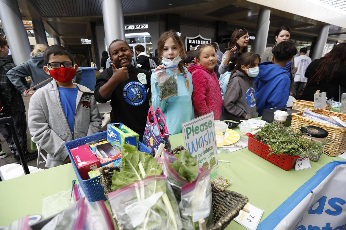 Vegas Verdes Elementary School students work at their booth, Friday, April 22, 2022, during the ...