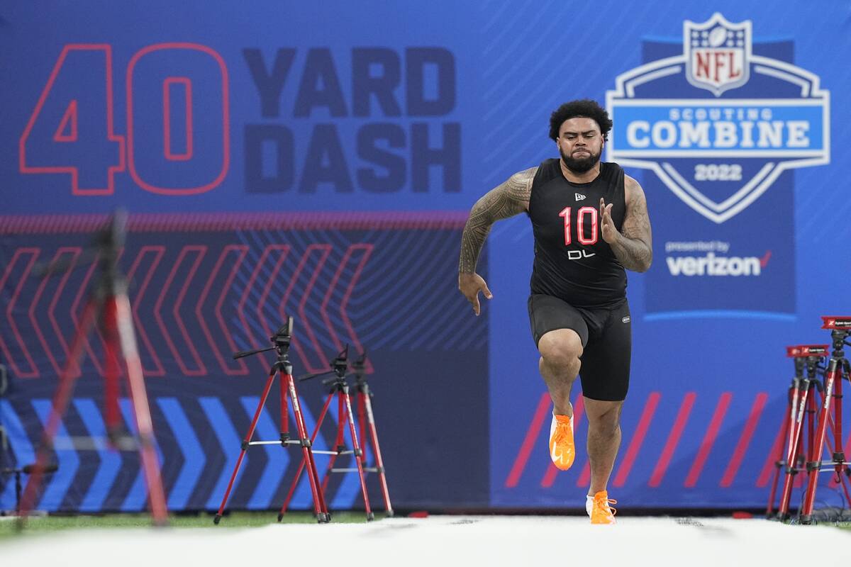 Ohio State defensive lineman Haskell Garrett runs the 40-yard dash during the NFL football scou ...