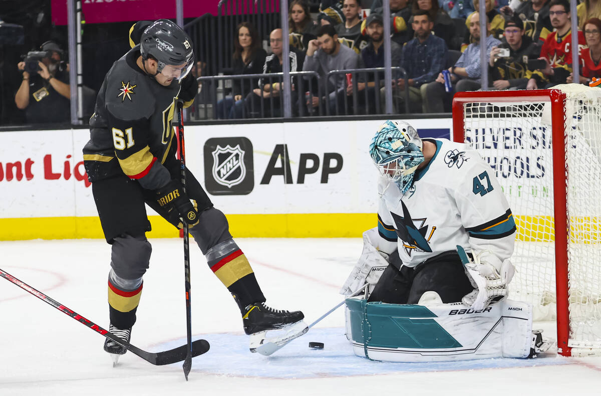 Golden Knights right wing Mark Stone (61) looks for the rebound shot as San Jose Sharks goalten ...