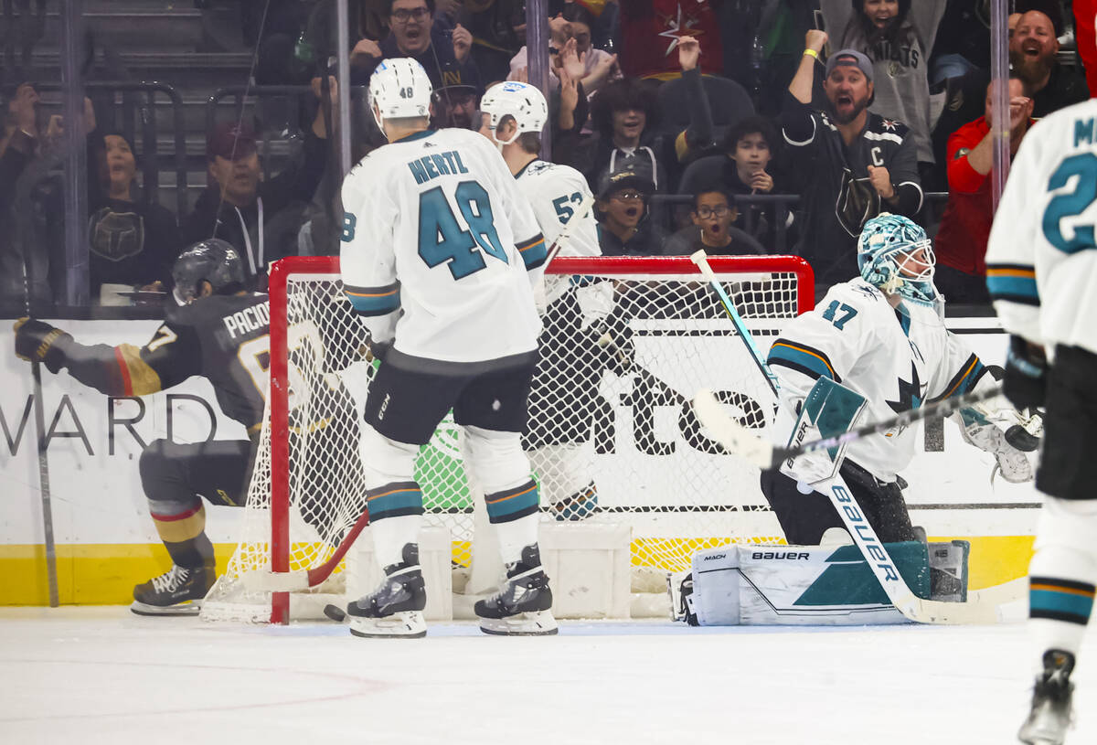 Golden Knights left wing Max Pacioretty, left, reacts after scoring a goal against San Jose Sha ...