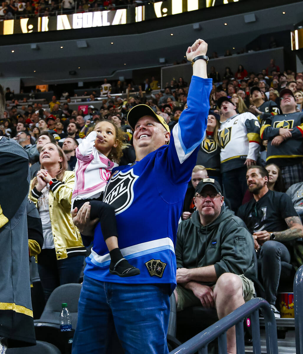 Golden Knights fans celebrate a goal by Golden Knights left wing Max Pacioretty, not pictured, ...