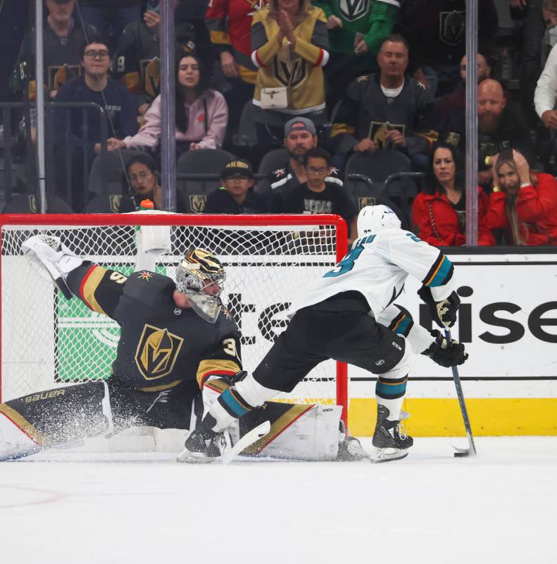 San Jose Sharks center Thomas Bordeleau (23) moves the puck around Golden Knights goaltender Lo ...