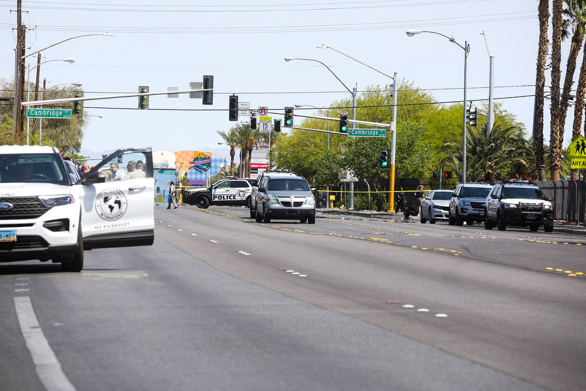 Police at the scene of a fatal shooting in central Las Vegas, Sunday, April 24, 2022. (Rachel A ...