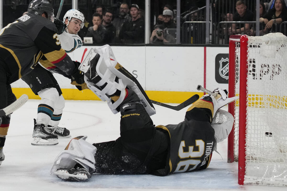 San Jose Sharks right wing Timo Meier, left, scores against Vegas Golden Knights goaltender Log ...