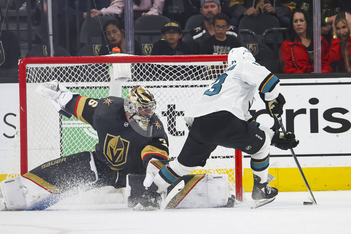 San Jose Sharks center Thomas Bordeleau (23) moves the puck around Golden Knights goaltender Lo ...