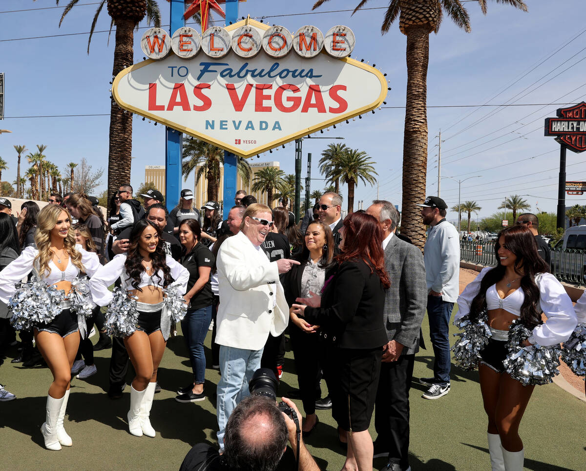 Raiders owner Mark Davis, center, visits with public officials at the Welcome to Fabulous Las V ...