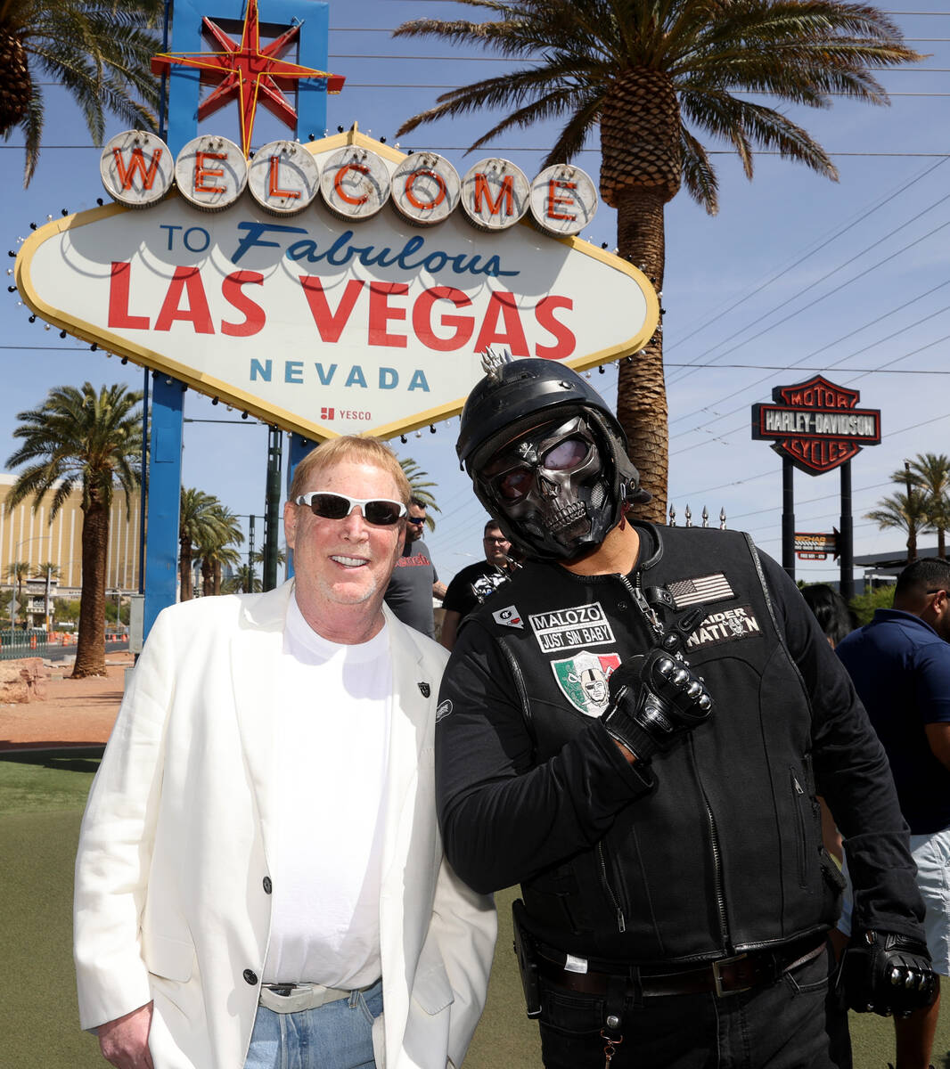 Raiders owner Mark Davis, left, with Eric Carrillo of Las Vegas at the Welcome to Fabulous Las ...
