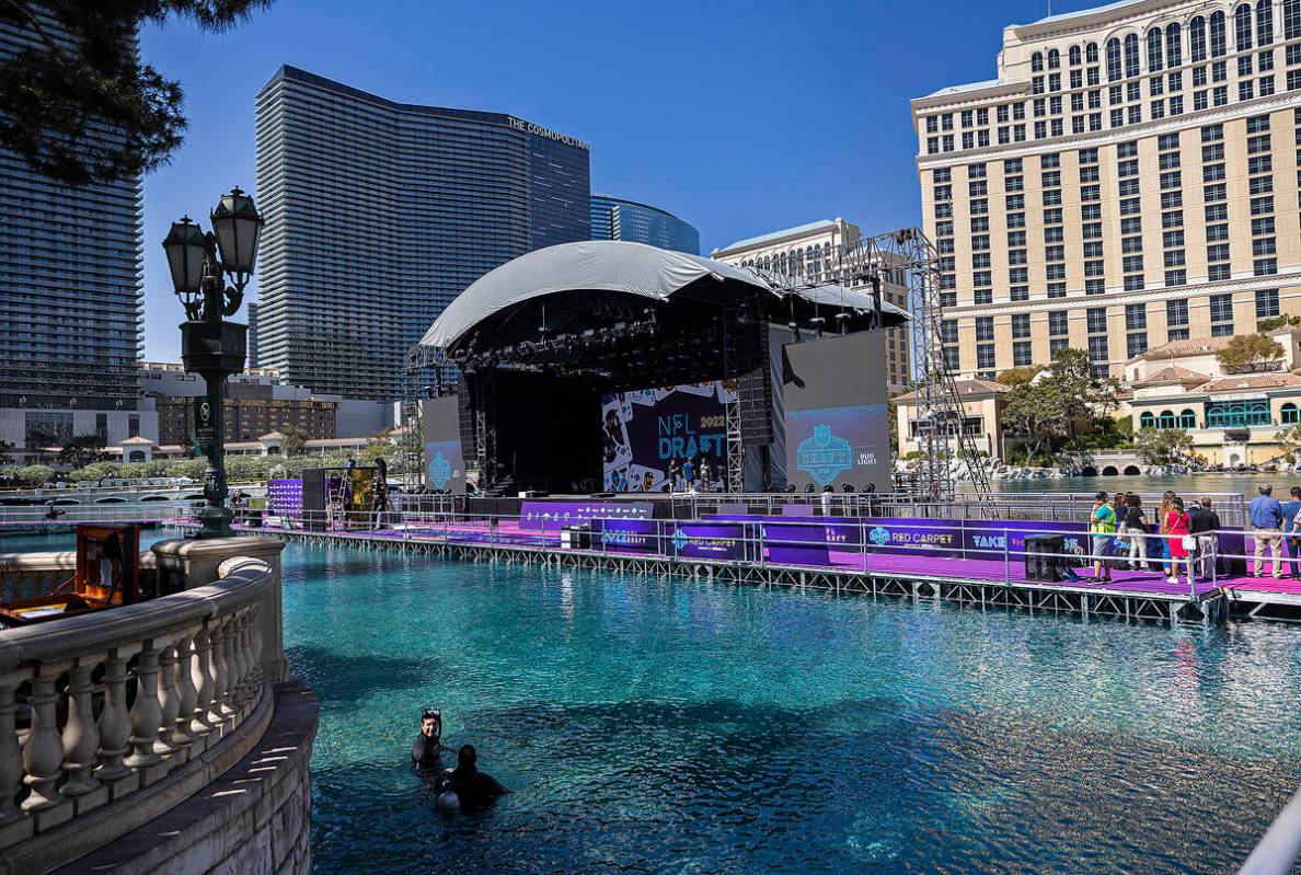 Workers continue to build the NFL Draft Red Carpet Stage at the Bellagio Fountains on Tuesday, ...
