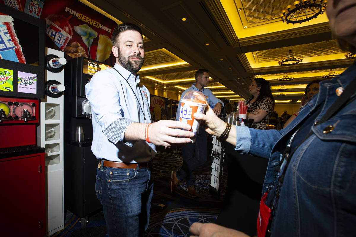 Mike Bailey, director of business development at The Icee Company, hands out an Icee at the Cin ...
