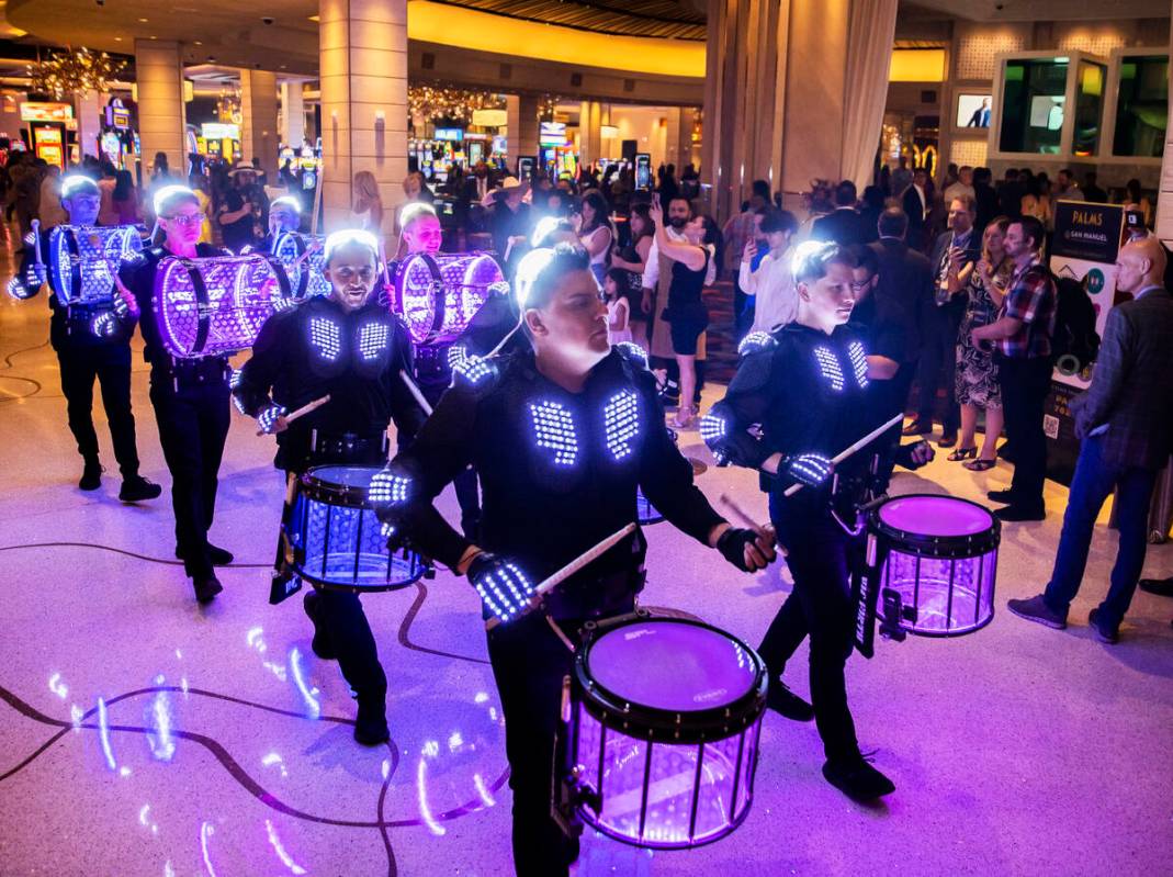 The Vegas Golden Knights Drumbots drumline perform during the reopening party at the Palms on W ...