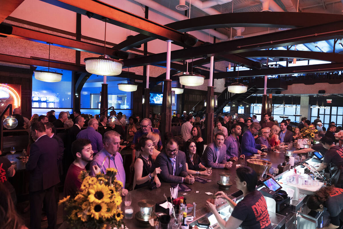 People socialize at Mabel's BBQ during the reopening party at the Palms on Wednesday, April 27, ...