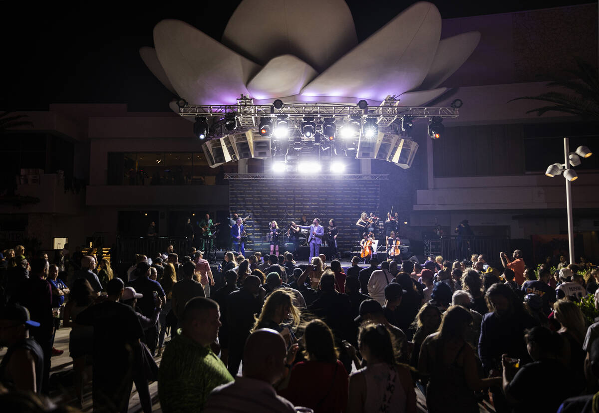 David Perrico Pop Strings Orchestra performs during an opening night party at Kaos at the Palms ...