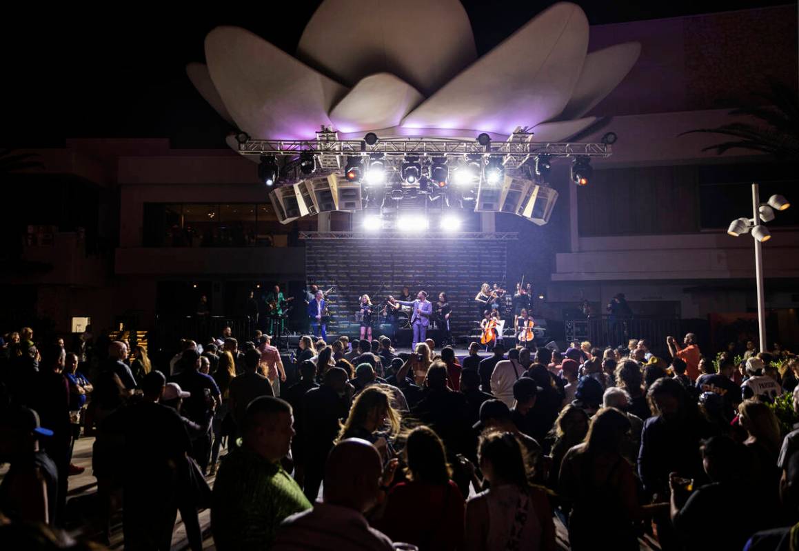 David Perrico Pop Strings Orchestra performs during an opening night party at Kaos at the Palms ...