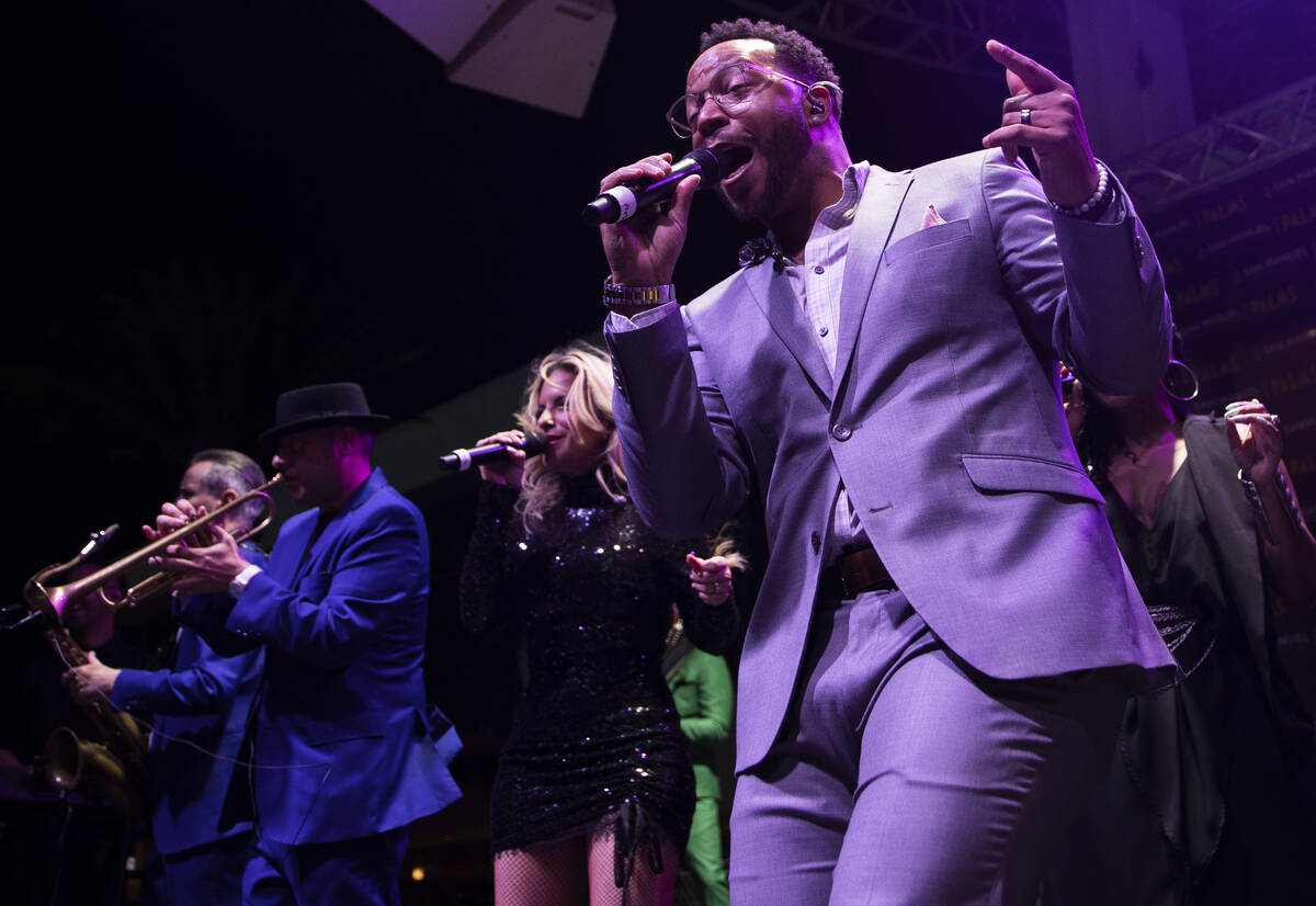 David Perrico Pop Strings Orchestra performs during an opening night party at Kaos at the Palms ...