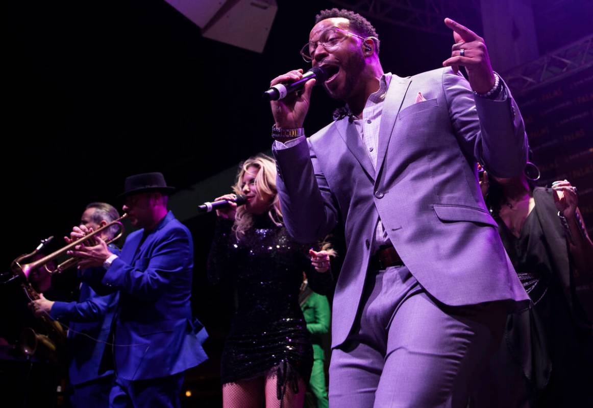 David Perrico Pop Strings Orchestra performs during an opening night party at Kaos at the Palms ...