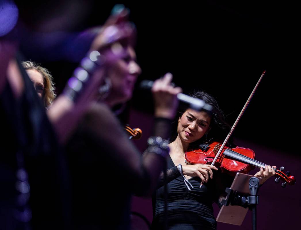 David Perrico Pop Strings Orchestra performs during an opening night party at Kaos at the Palms ...