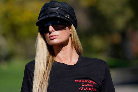Paris Hilton looks on during a protest Friday, Oct. 9, 2020, in Provo, Utah. (AP Photo/Rick Bowmer)