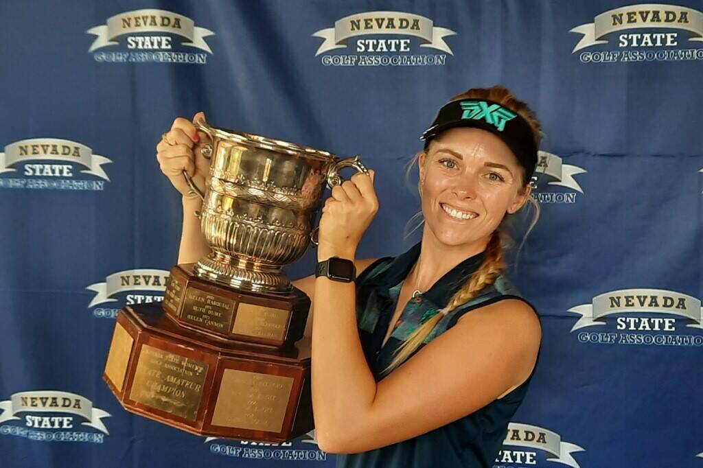 Veronica Joels hoists the trophy after winning the Nevada Women's State Amateur for the third t ...