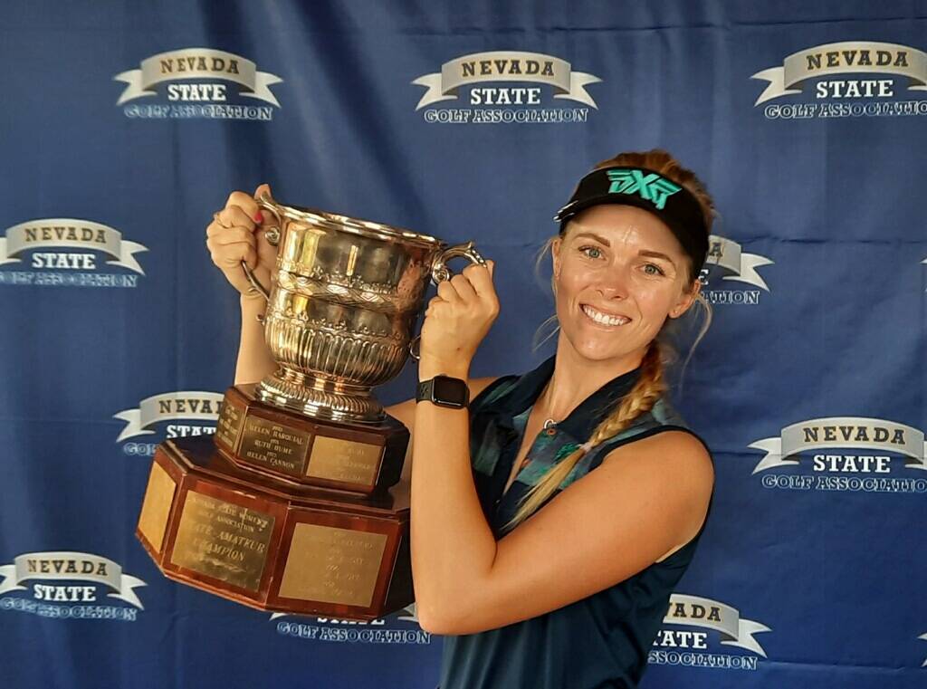 Veronica Joels hoists the trophy after winning the Nevada Women's State Amateur for the third t ...