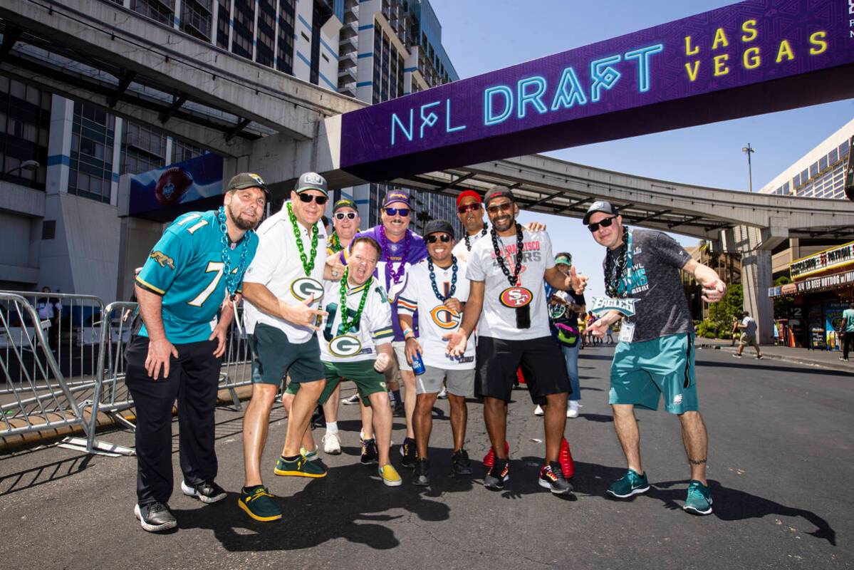 A group of friends from Wisconsin pose for a picture as they arrive for the first day of the NF ...