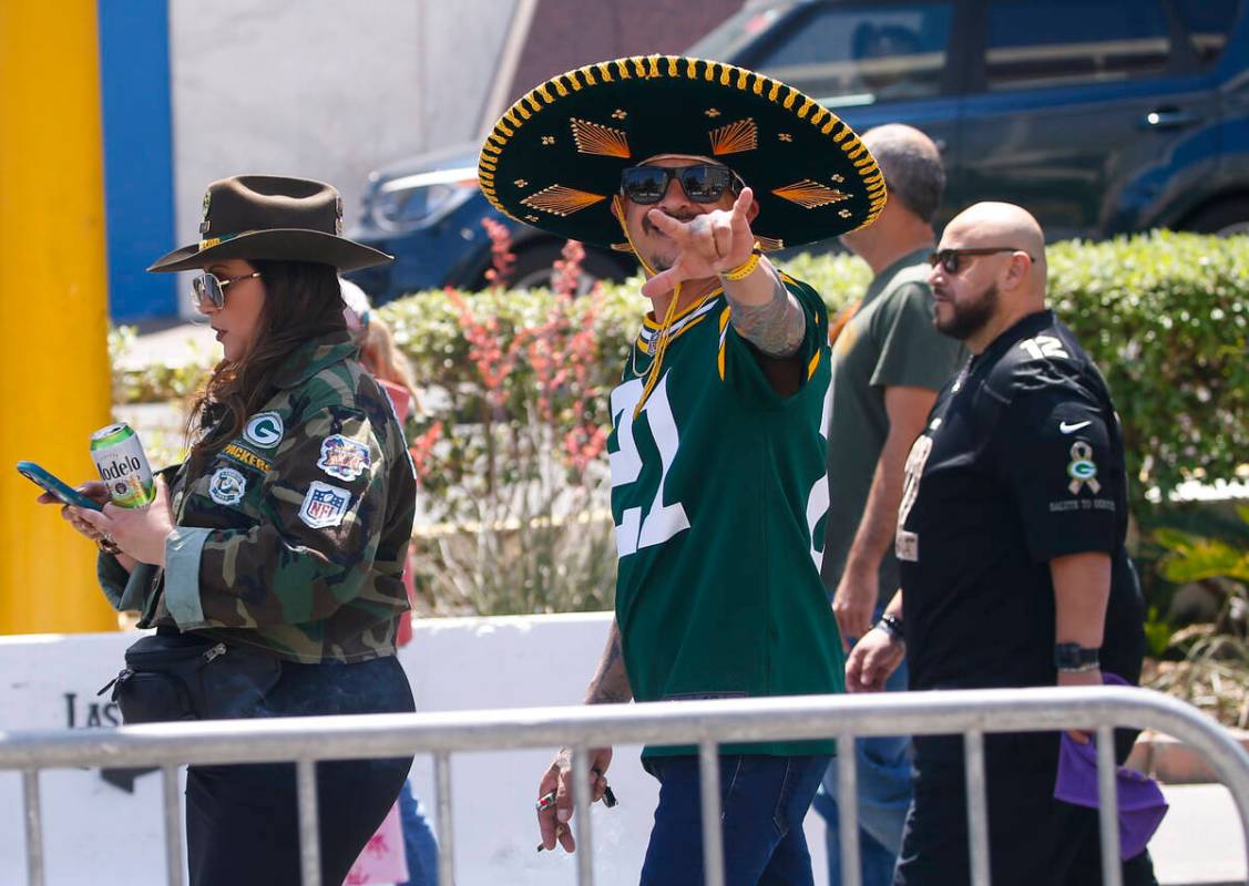 Green Bay Packers fans arrive for the first day of the NFL draft on Thursday, April 28, 2022, i ...