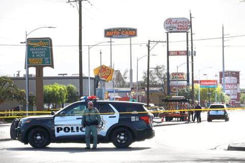 Las Vegas police investigate a shooting near the intersection of Decatur and Charleston bouleva ...