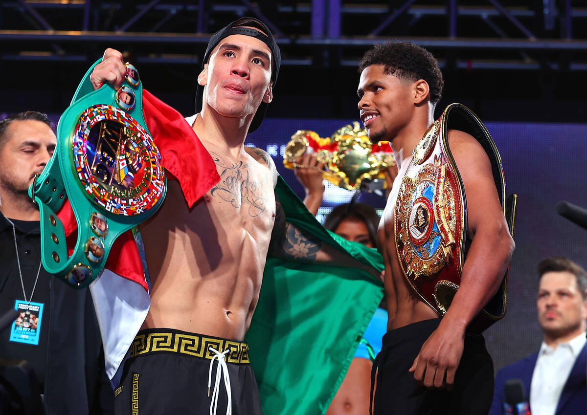 LAS VEGAS, NEVADA - APRIL 29: Oscar Valdez (L) and Shakur Stevenson (R) face-off during the wei ...