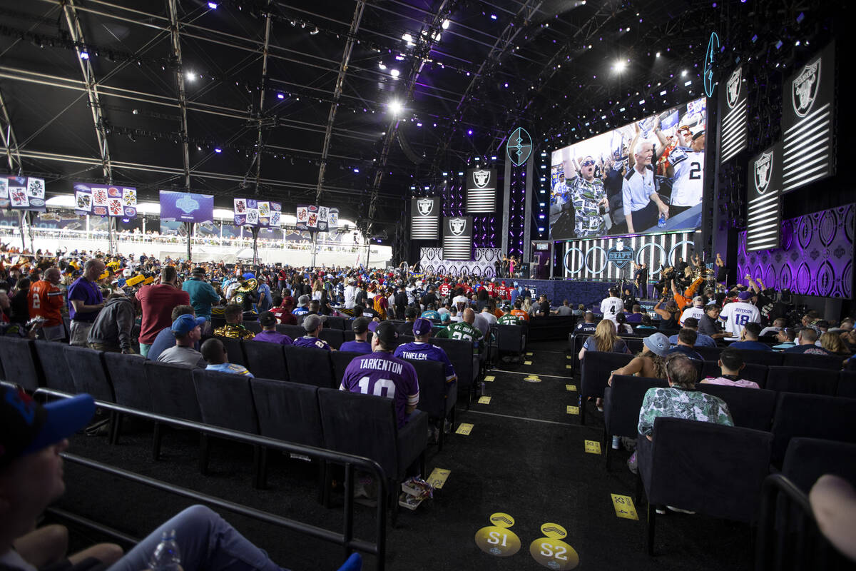 Fans attend the second day of the NFL Draft event in Las Vegas, Friday, April 29, 2022. (Erik V ...